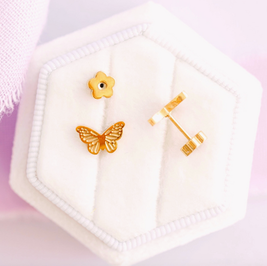 Gold butterfly screw back earrings from Pierced Co displayed on a white background, showcasing their classic design and secure fastening.