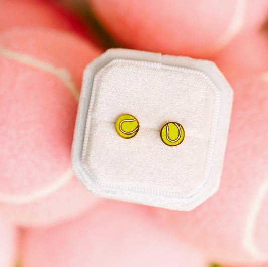 Girls tennis ball flat screw back earrings by Pierced Co featuring small, colorful tennis ball charms on a silver setting.
