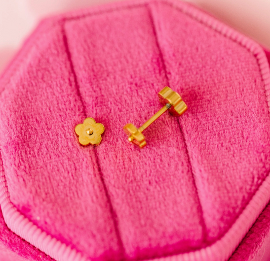 Tiny gold flower screw back earring by Pierced Co, featuring a delicate classic floral design in shiny gold metal.