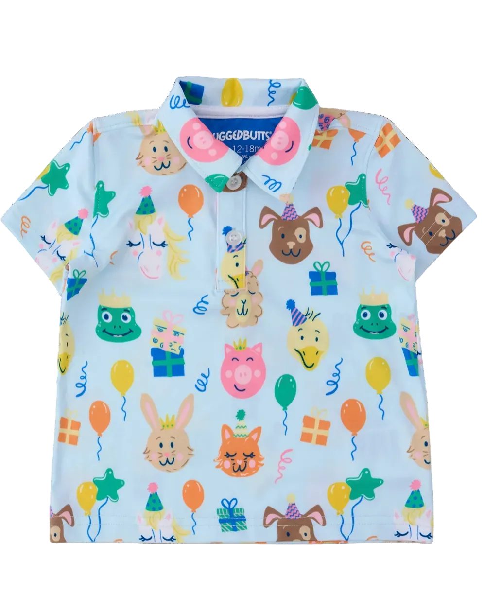 Boys' birthday party animals knit short sleeve performance polo by Ruffle Butts, featuring colorful animal print and a casual fit.