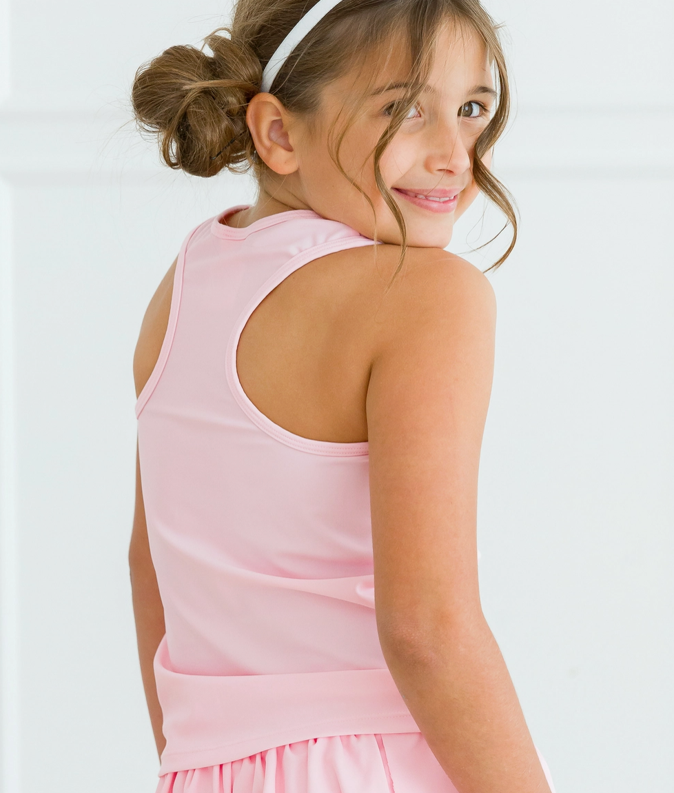 Girls pink active tank top by Ruffle Butts, featuring a comfortable sleeveless design with ruffle accents.