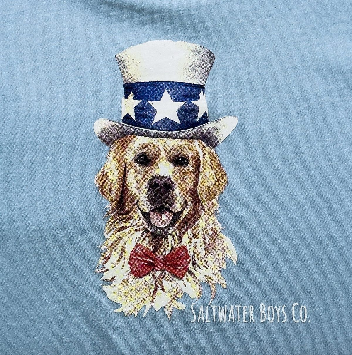 Red, white, and blue patriotic pup graphic tee for kids by Saltwater Boys Company, featuring a playful dog design.