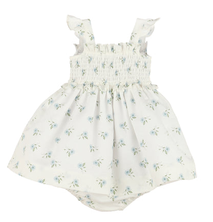 Girl wearing a blue watercolor floral smock sundress by Sophie & Lucas, featuring a relaxed fit and delicate flower print.