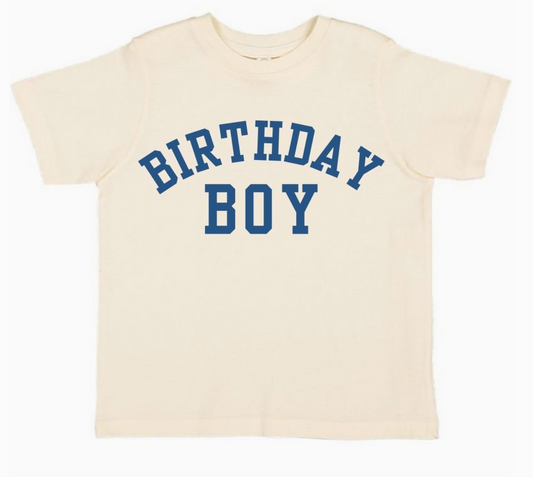 Birthday Boy varsity short sleeve T-shirt by Sweet Wink featuring a colorful design and bold lettering for celebrating birthdays.