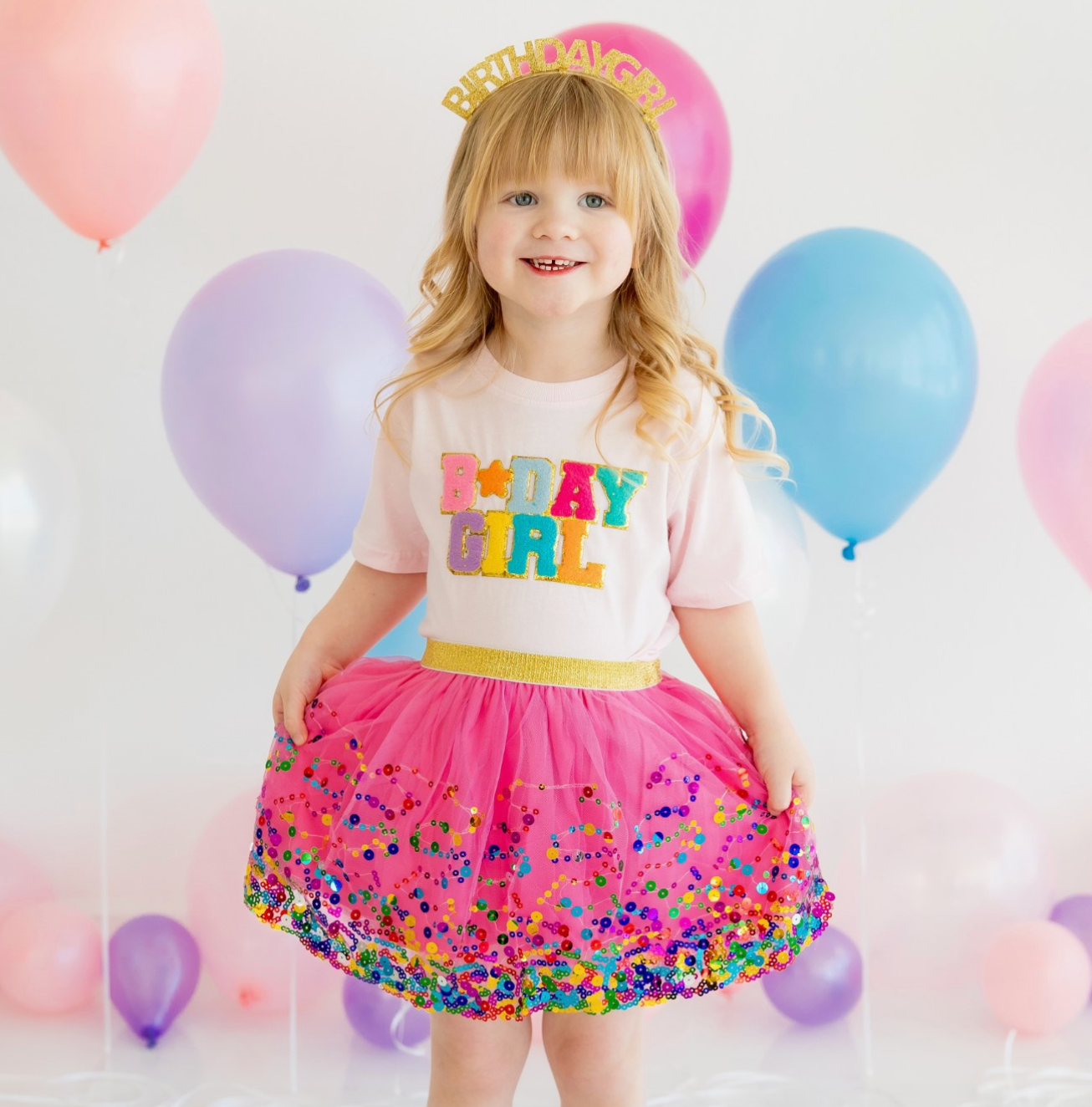 Pink birthday girl patch T-shirt by Sweet Wink featuring a fun embroidered "Birthday Girl" design on the front.