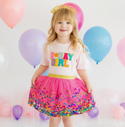 Pink birthday girl patch T-shirt by Sweet Wink featuring a fun embroidered "Birthday Girl" design on the front.