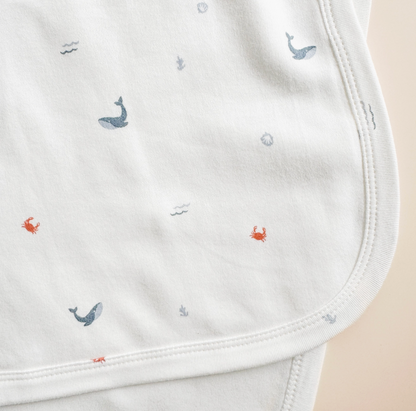 Organic cotton nautical-themed layette set by The Blueberry Hill for babies, includes baby clothes perfect for a baby shower gift.