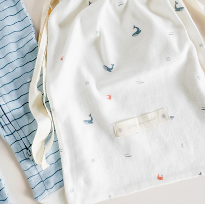 Organic cotton baby layette set with nautical ocean design from The Blueberry Hill, perfect for baby shower gift.