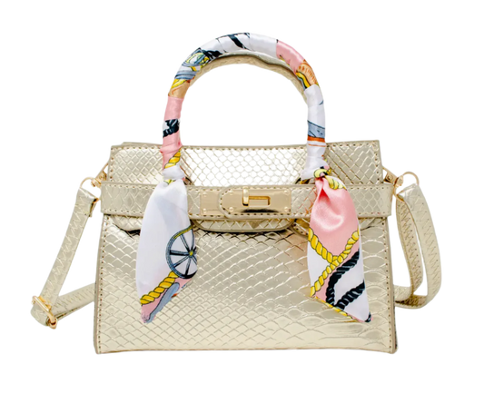 Gold crocodile-pattern scarf handbag by Tiny Treat and Zomi Gems, featuring textured crocodile skin design and elegant gold finish.