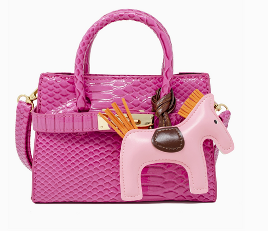 Girls crocodile-pattern handbag with a pink pony charm from Tiny Treat and Zomi Gems, featuring a cute, textured design.