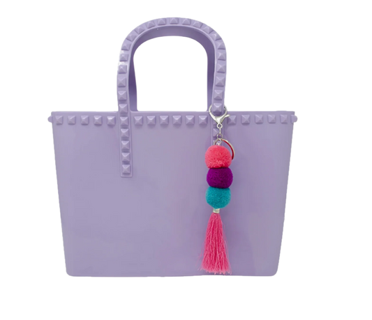 Kids jumbo jelly tote bag with lavender tassels by Tiny Treat and Zomi Gems, featuring a translucent jelly design perfect for children.
