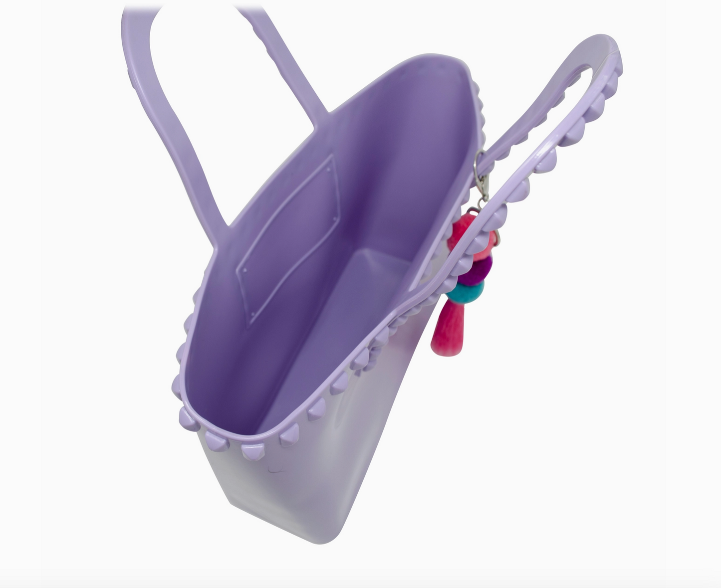 Kids jumbo jelly tote bag with tassels in lavender, by Tiny Treat and Zomi Gems, featuring transparent jelly material and playful design.