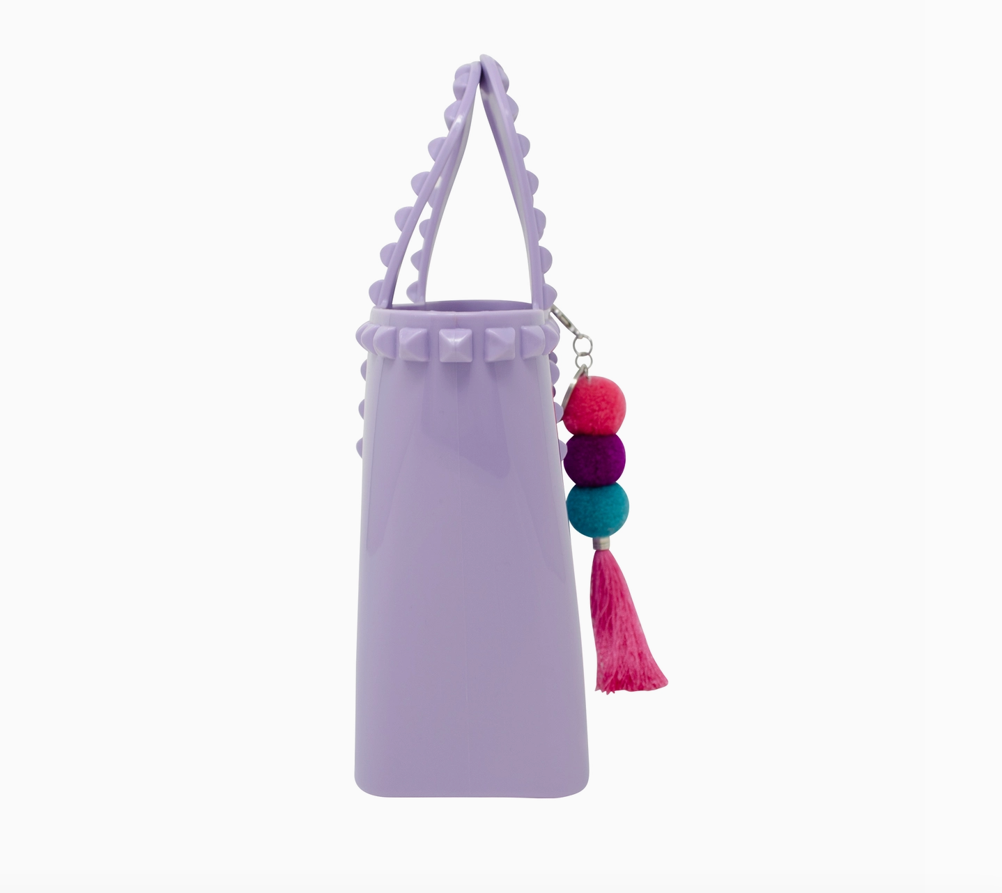 Kids jumbo jelly tote bag with tassels in lavender color by Tiny Treat and Zomi Gems, featuring a clear, flexible design.