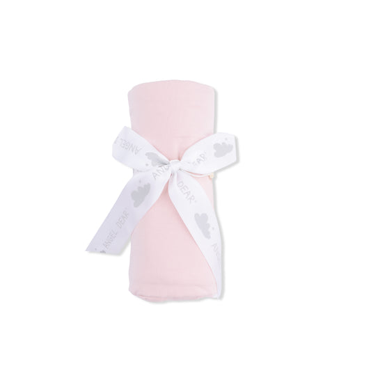 Soft pink baby swaddle blanket from Angel Dear with lotus pattern, perfect for cozy newborn cuddles.