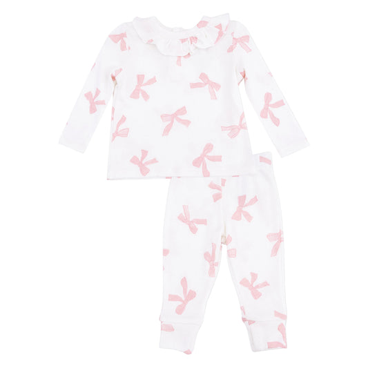 Baby girl wearing a pink long sleeve ruffle top and matching pants set by Angel Dear, soft cotton fabric with ruffle details.