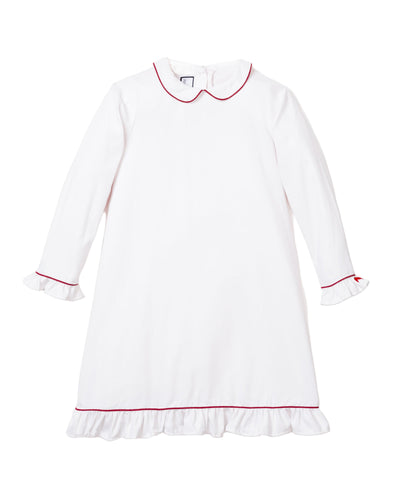 White dress with red trim on a white background