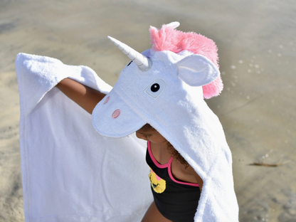 Kids hooded unicorn towel by Yikes Twins featuring a colorful unicorn hood and soft, absorbent material for children.