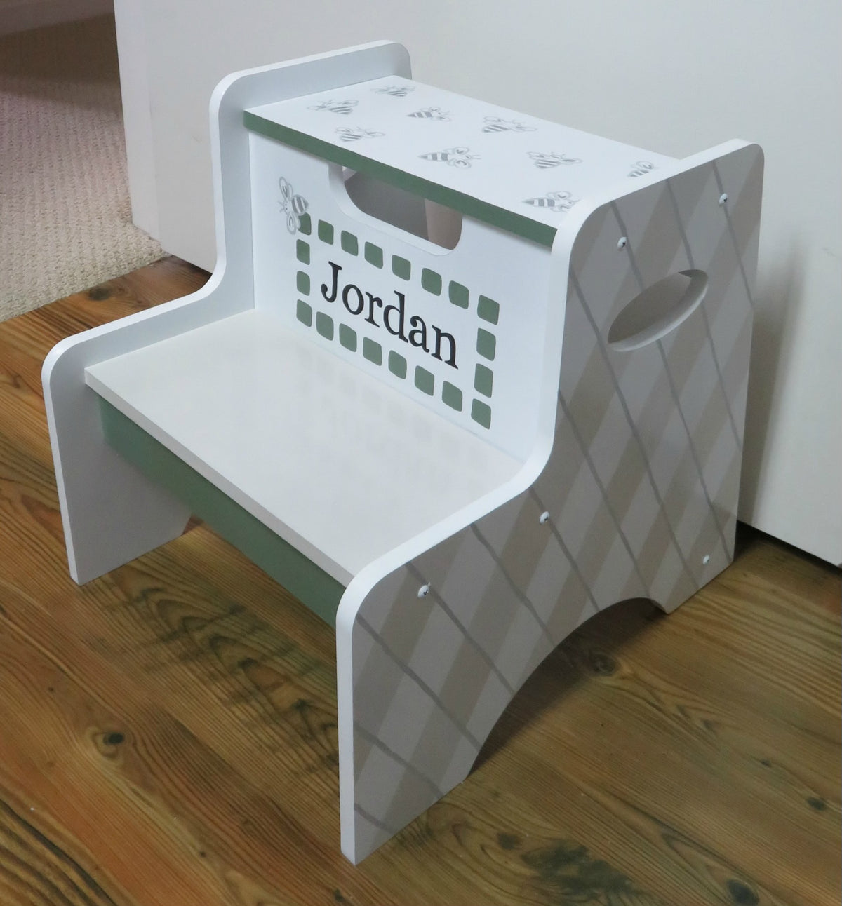 Hand-painted 2-step stool by Flora Ottimer, featuring colorful custom artwork and sturdy wooden construction.