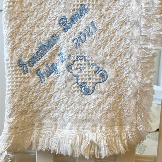 Monogrammed cotton carriage throw by Flora Ottimer, soft and cozy with personalized embroidered initials on elegant fabric.