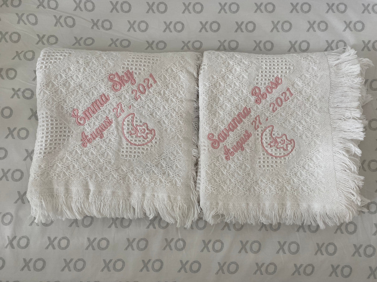 Monogrammed cotton carriage throw by Flora Ottimer, soft and elegant with personalized monogram detail on woven fabric.