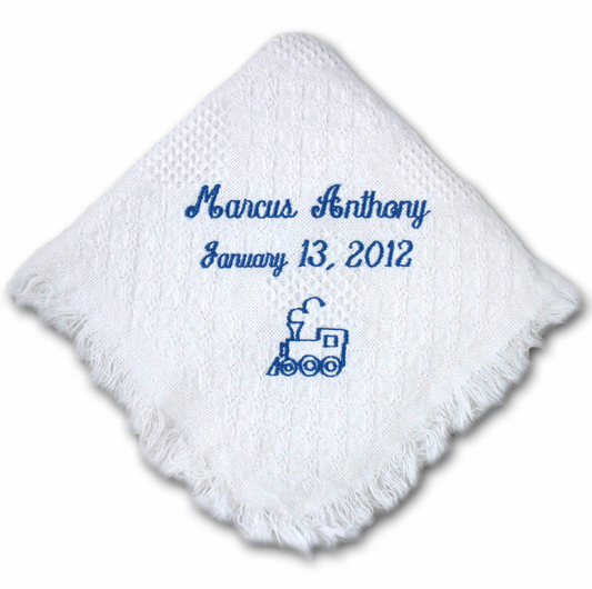 Monogrammed Flora Ottimer cotton carriage throw with elegant embroidered initials on soft, woven fabric for cozy decor.