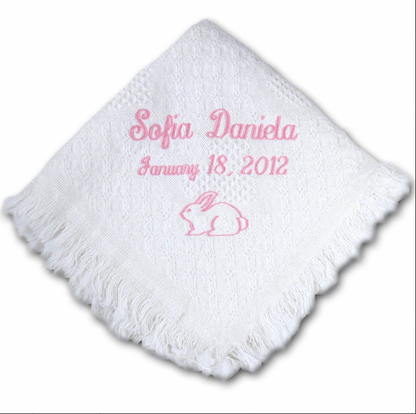 Monogrammed cotton carriage throw by Flora Ottimer, featuring a soft, decorative fabric with personalized monogram design.