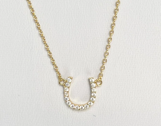 Silver Lucky Horseshoe pendant by Jack and Jewelz featuring a polished horseshoe charm on a delicate chain.