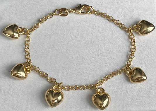 Jack and Jewelz puffed heart charm bracelet featuring a delicate chain and a prominent puffed heart pendant.