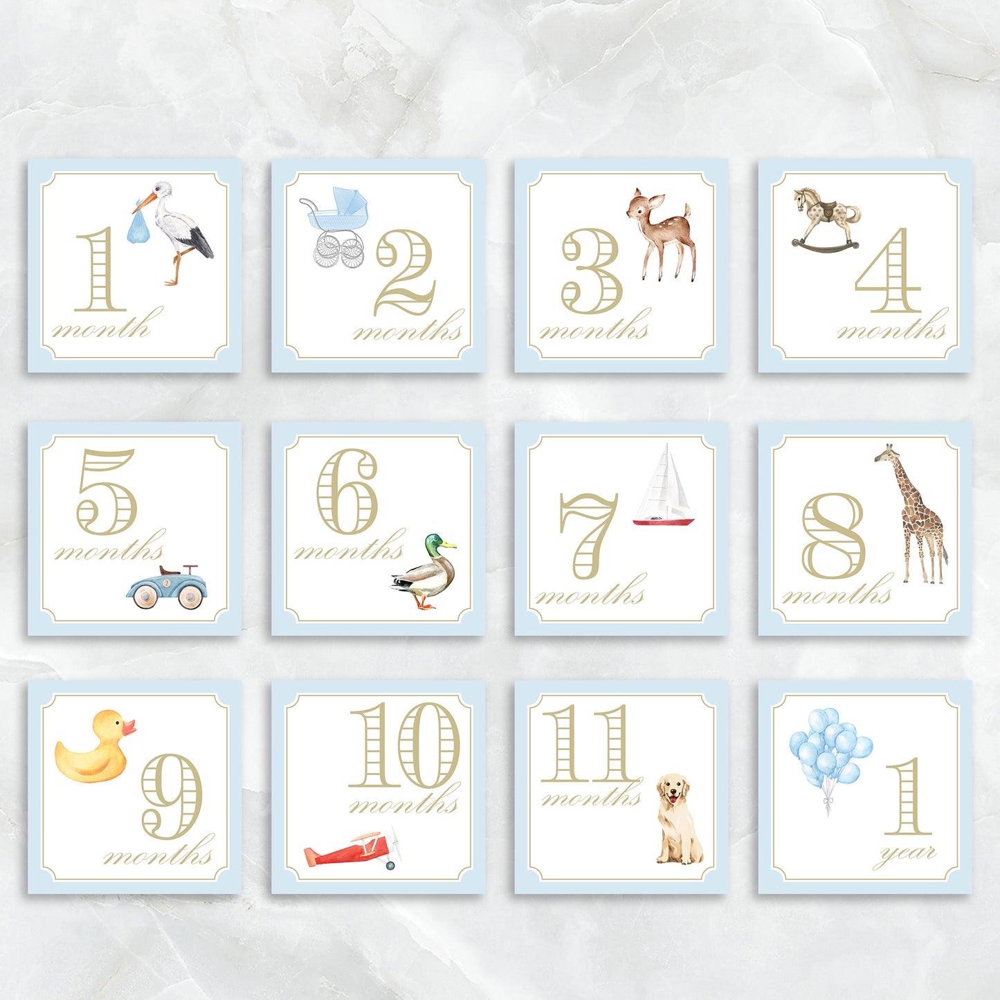 Blue baby milestone card box set by Katherine Kelly featuring a collection of milestone cards for baby boy.