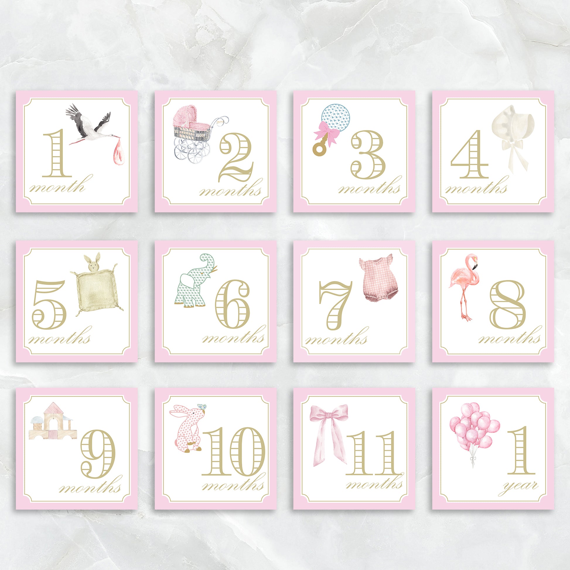Pink milestone card set for girls by Katherine Kelly featuring baby milestone cards in a charming box.