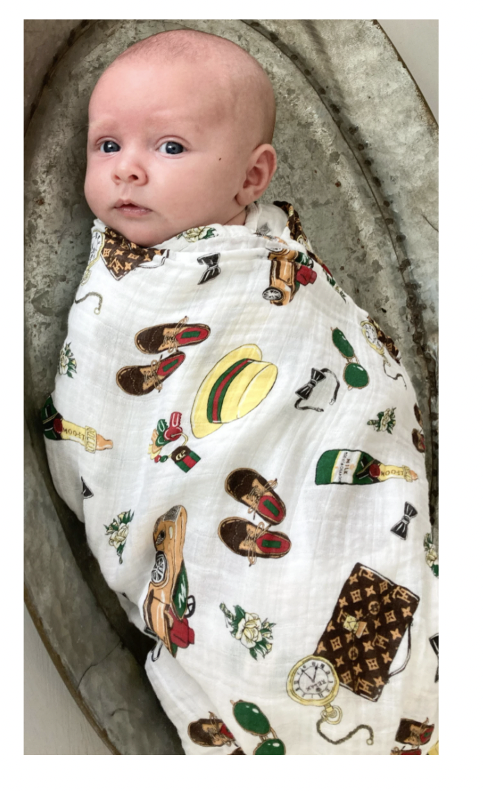Soft baby swaddle blanket by Little Hometown, featuring a Dapper Napper design, made for cozy newborn comfort and gentle wrapping.