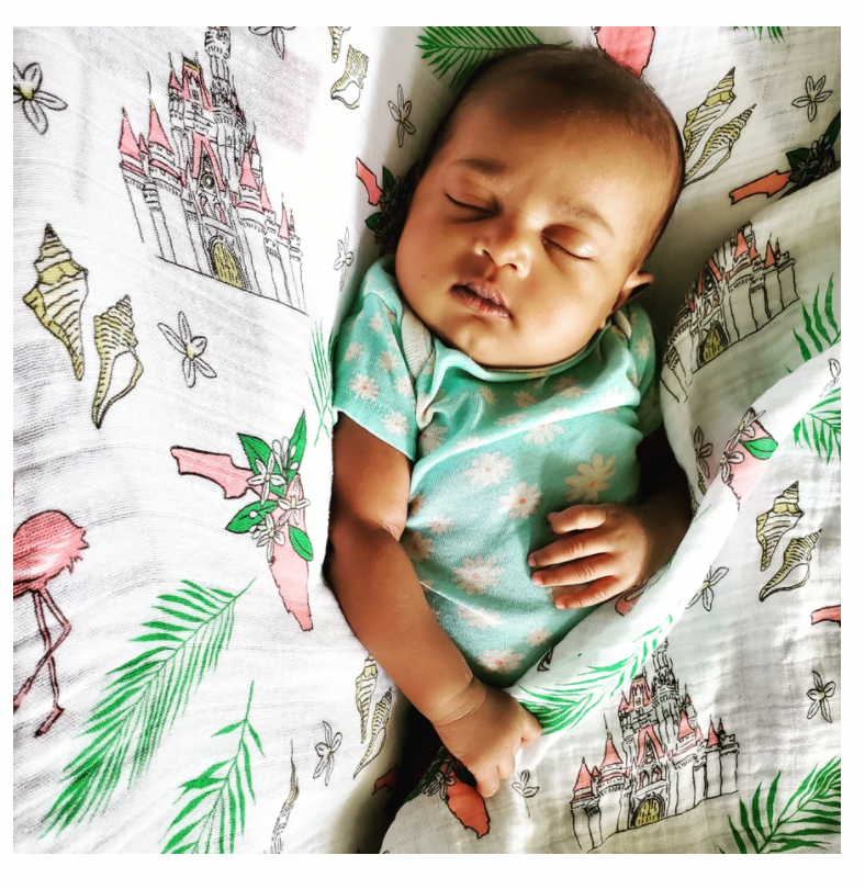 Soft baby swaddle blanket from Little Hometown featuring a Florida Girl design, ideal for soothing and wrapping infants.