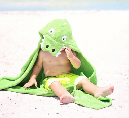 Kids alligator hooded towel by Yikes Twins, featuring a playful green alligator design with a hood for drying and fun bath time.