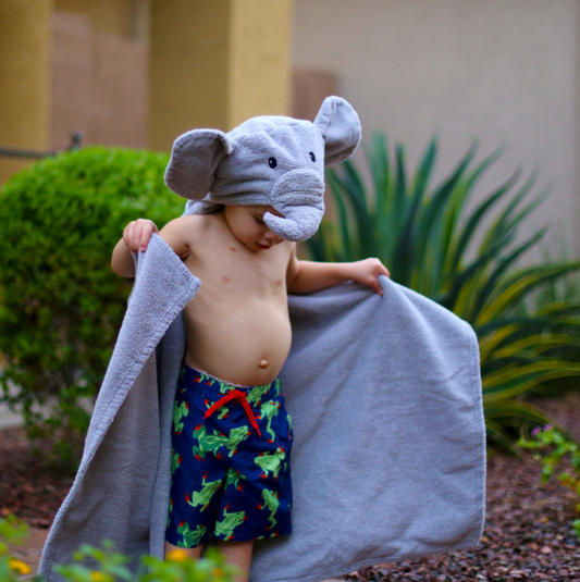 Kids Elephant Hooded Towel by Yikes Twins, featuring a soft, plush towel with an adorable elephant hood for children.