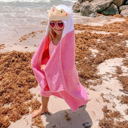 Kids pink princess hooded towel by Yikes Twins, featuring a hood with princess crown design, soft and cozy for children.