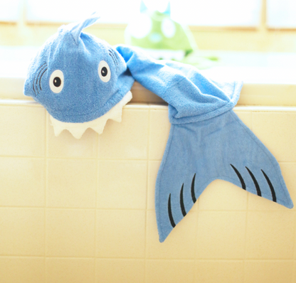 Kids Shark Hooded Towel by Yikes Twins featuring a playful shark design with a hood for cozy, fun bath time.
